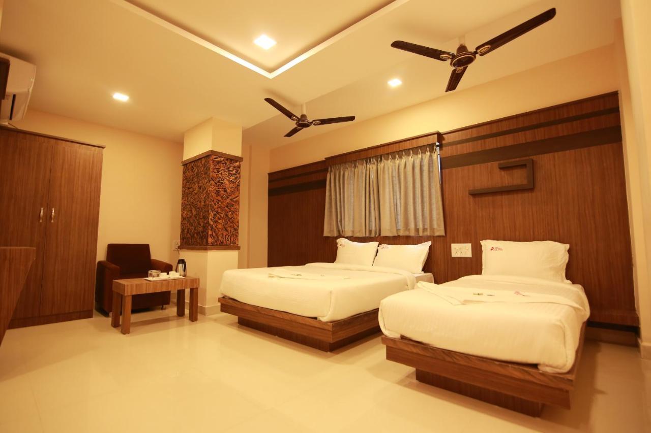 Hotel Apple Suites Бангалор Екстериор снимка